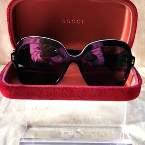 Gucci Black Sunglasses With an Elegant White Trim